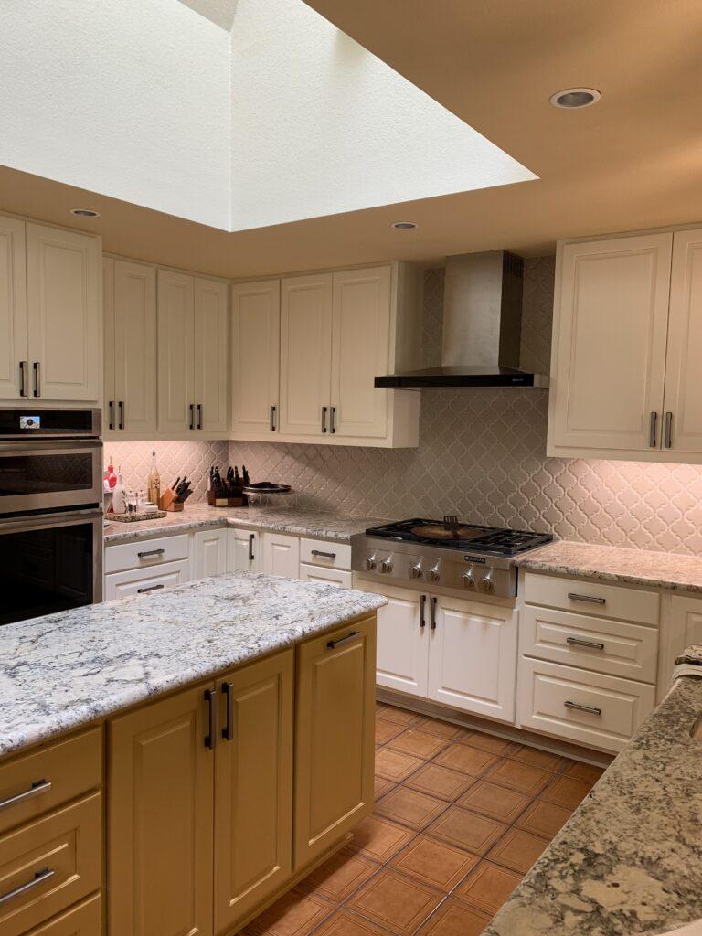 Painted kitchen cabinetry from Magna Painting's website
